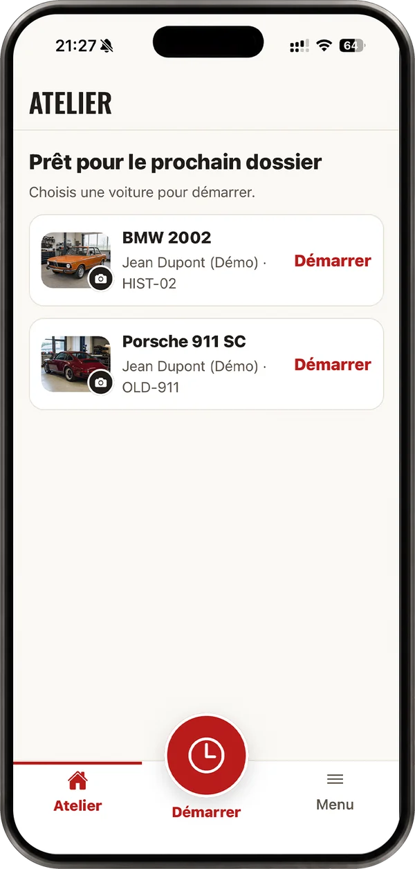 Écran Atelier de l'application Garagio sur iPhone : deux voitures prêtes, une BMW 2002 et une Porsche 911 SC, chacune avec son bouton Démarrer.